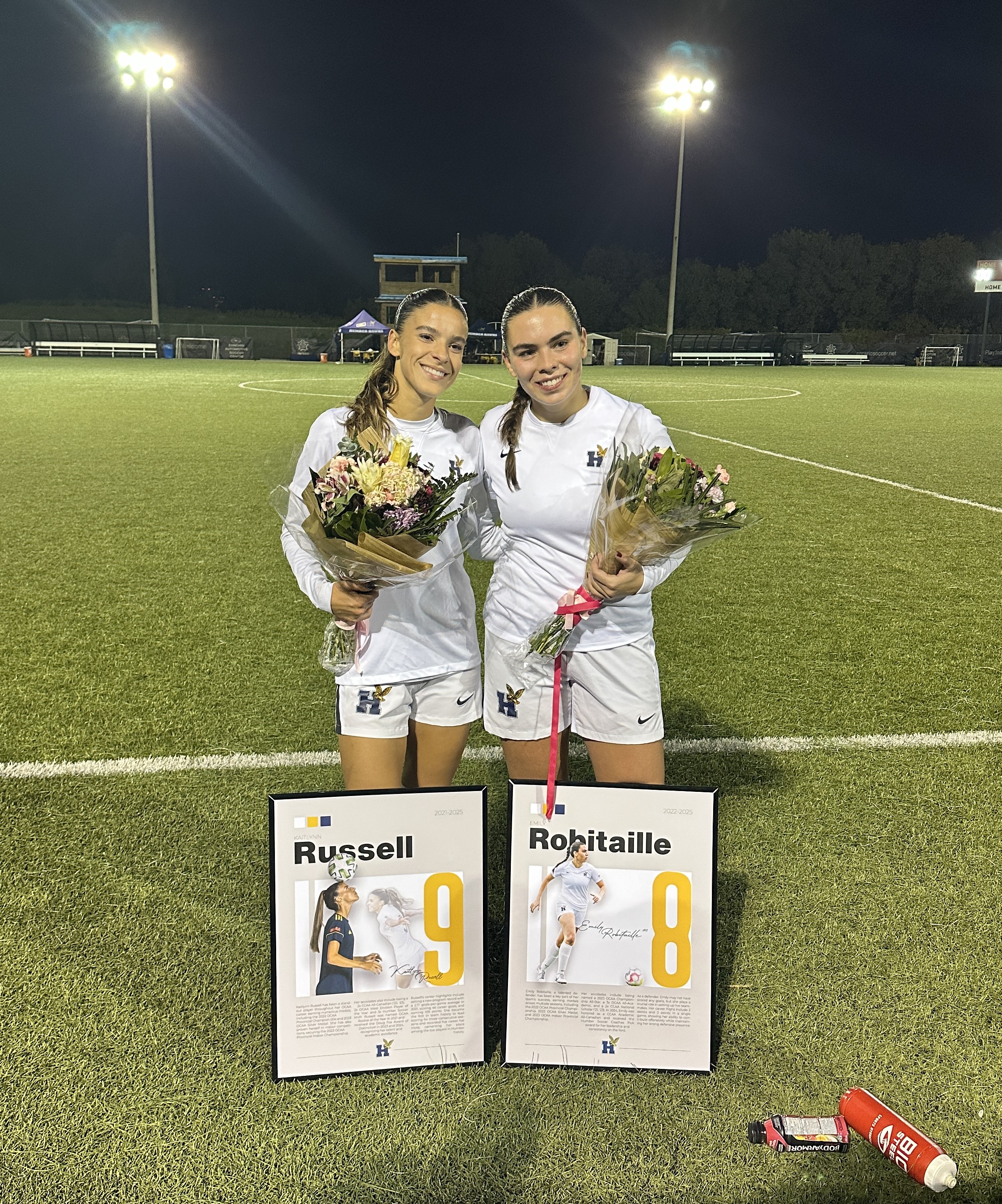 Kaitlynn and Emily with their soccer posters